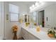 Single vanity bathroom with window at 44049 W Palo Nuez St, Maricopa, AZ 85138