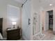 Bathroom with walk-in shower, toilet, and closet at 44049 W Palo Nuez St, Maricopa, AZ 85138
