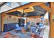 Relaxing covered patio with seating area, perfect for outdoor entertaining at 44049 W Palo Nuez St, Maricopa, AZ 85138