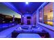 Relaxing covered patio with comfortable seating, ceiling fan, overlooking the pool, great for outdoor living at 44049 W Palo Nuez St, Maricopa, AZ 85138