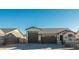 Single story home with 2 car garage and attractive curb appeal at 44049 W Palo Nuez St, Maricopa, AZ 85138