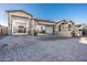 Spacious two-car garage with extra-wide driveway at 44049 W Palo Nuez St, Maricopa, AZ 85138
