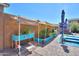 Landscaped garden with raised garden beds and various plants at 44049 W Palo Nuez St, Maricopa, AZ 85138