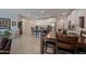 Modern kitchen with white cabinets, a large island, and stainless steel appliances at 44049 W Palo Nuez St, Maricopa, AZ 85138