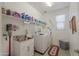 Laundry room with washer, dryer, and sink at 44049 W Palo Nuez St, Maricopa, AZ 85138