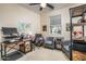 Home office with desk, chairs, and shelving at 44049 W Palo Nuez St, Maricopa, AZ 85138