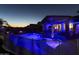Inviting backyard pool with safety fence, patio and lounge area, perfect for outdoor entertaining at 44049 W Palo Nuez St, Maricopa, AZ 85138