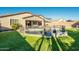 Large backyard with a circular pool and fenced area, providing a safe space for and pets at 44049 W Palo Nuez St, Maricopa, AZ 85138