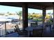 Community patio with table and chairs, offering views of the neighborhood at 5735 E Mcdowell Rd # 306, Mesa, AZ 85215