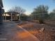 Spacious backyard with stone pathway and pergola at 5822 E Bramble Berry Ln, Cave Creek, AZ 85331