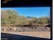 Enjoy the scenic mountain views from the backyard patio at 5822 E Bramble Berry Ln, Cave Creek, AZ 85331
