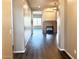 Spacious entryway with hardwood floors and a fireplace at 5822 E Bramble Berry Ln, Cave Creek, AZ 85331