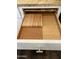 Custom kitchen drawer insert with knife block and cutting board at 5822 E Bramble Berry Ln, Cave Creek, AZ 85331