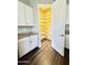 Walk-in pantry with ample shelving for storage at 5822 E Bramble Berry Ln, Cave Creek, AZ 85331