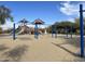 playground with swings and slides at 5822 E Bramble Berry Ln, Cave Creek, AZ 85331