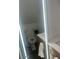 Modern bathroom with sleek vanity, illuminated mirror, and stylish fixtures at 5954 W Townley Ave, Glendale, AZ 85302
