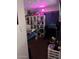 Youth bedroom with a bed, shelving and vibrant decor at 5954 W Townley Ave, Glendale, AZ 85302