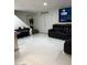 Spacious living area with tiled floors and ample natural light at 5954 W Townley Ave, Glendale, AZ 85302