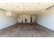 Attached garage with overhead storage and ample space for parking at 6121 E Vernon Ave, Scottsdale, AZ 85257