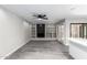 Living room with a built-in fireplace and shelving at 6121 E Vernon Ave, Scottsdale, AZ 85257