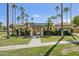 Community pool area with covered patio and gate at 6248 E Aire Libre Ln, Scottsdale, AZ 85254