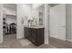 Bathroom with granite countertop and walk-in closet at 640 S Olympic Dr, Gilbert, AZ 85296