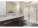 Bathroom with granite countertops and a large walk-in shower at 640 S Olympic Dr, Gilbert, AZ 85296
