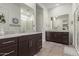 Double vanity bathroom with granite countertops at 640 S Olympic Dr, Gilbert, AZ 85296