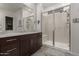 Modern bathroom with granite vanity and large shower at 640 S Olympic Dr, Gilbert, AZ 85296