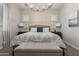 Bright bedroom with a comfortable bed and stylish decor at 640 S Olympic Dr, Gilbert, AZ 85296