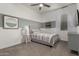 Bright bedroom with ceiling fan and neutral decor at 640 S Olympic Dr, Gilbert, AZ 85296