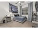 Bedroom with a Starry Night tapestry and ceiling fan at 640 S Olympic Dr, Gilbert, AZ 85296