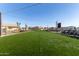 Expansive grassy area with string lights and seating at 640 S Olympic Dr, Gilbert, AZ 85296