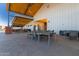 Outdoor community room with tables and seating at 640 S Olympic Dr, Gilbert, AZ 85296