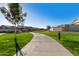 Paved pathway meanders through greenbelt at 640 S Olympic Dr, Gilbert, AZ 85296