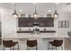 Modern kitchen features a large island with granite countertops at 640 S Olympic Dr, Gilbert, AZ 85296