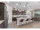 Modern kitchen with large island, granite counters, and stainless steel appliances at 640 S Olympic Dr, Gilbert, AZ 85296