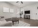 Living room with sectional sofa and coffee table, great for relaxing at 640 S Olympic Dr, Gilbert, AZ 85296