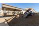 Wooden play structure and covered play area at 640 S Olympic Dr, Gilbert, AZ 85296