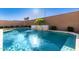 Sparkling pool and spa with a beautiful water feature at 640 S Olympic Dr, Gilbert, AZ 85296