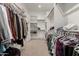 Spacious walk-in closet with plenty of shelving at 640 S Olympic Dr, Gilbert, AZ 85296