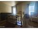 Bedroom with a bed, nightstand, and additional seating at 650 N Hawes Rd # 3702, Mesa, AZ 85207
