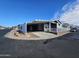 Single-level home with carport and landscaped yard at 650 N Hawes Rd # 3702, Mesa, AZ 85207