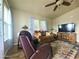 Spacious living room with comfy seating and large TV at 650 N Hawes Rd # 3702, Mesa, AZ 85207