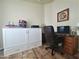 Home office with built-in desk and wood flooring at 650 N Hawes Rd # 3702, Mesa, AZ 85207