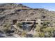 Luxury estate home on mountainside; private setting with pool and landscaping at 7150 N 64Th Pl, Paradise Valley, AZ 85253