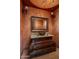 Upscale bathroom with ornate vanity and granite countertop at 7150 N 64Th Pl, Paradise Valley, AZ 85253