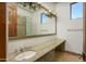 Large bathroom with granite countertop and updated sink at 7150 N 64Th Pl, Paradise Valley, AZ 85253