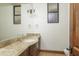 Elegant bathroom with marble vanity and modern fixtures at 7150 N 64Th Pl, Paradise Valley, AZ 85253