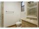 Bathroom with shower, toilet and granite vanity at 7150 N 64Th Pl, Paradise Valley, AZ 85253